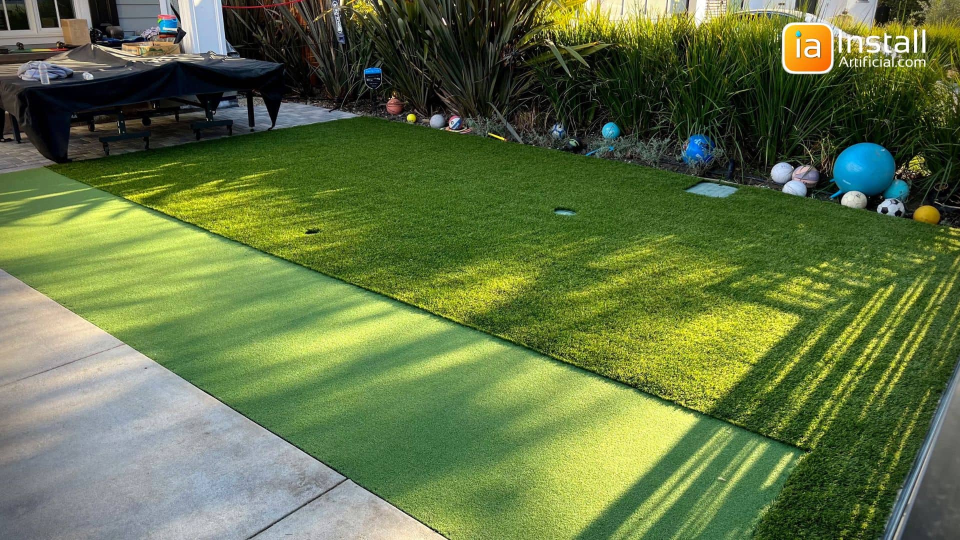 Artificial turf for pulling sleds backyard design