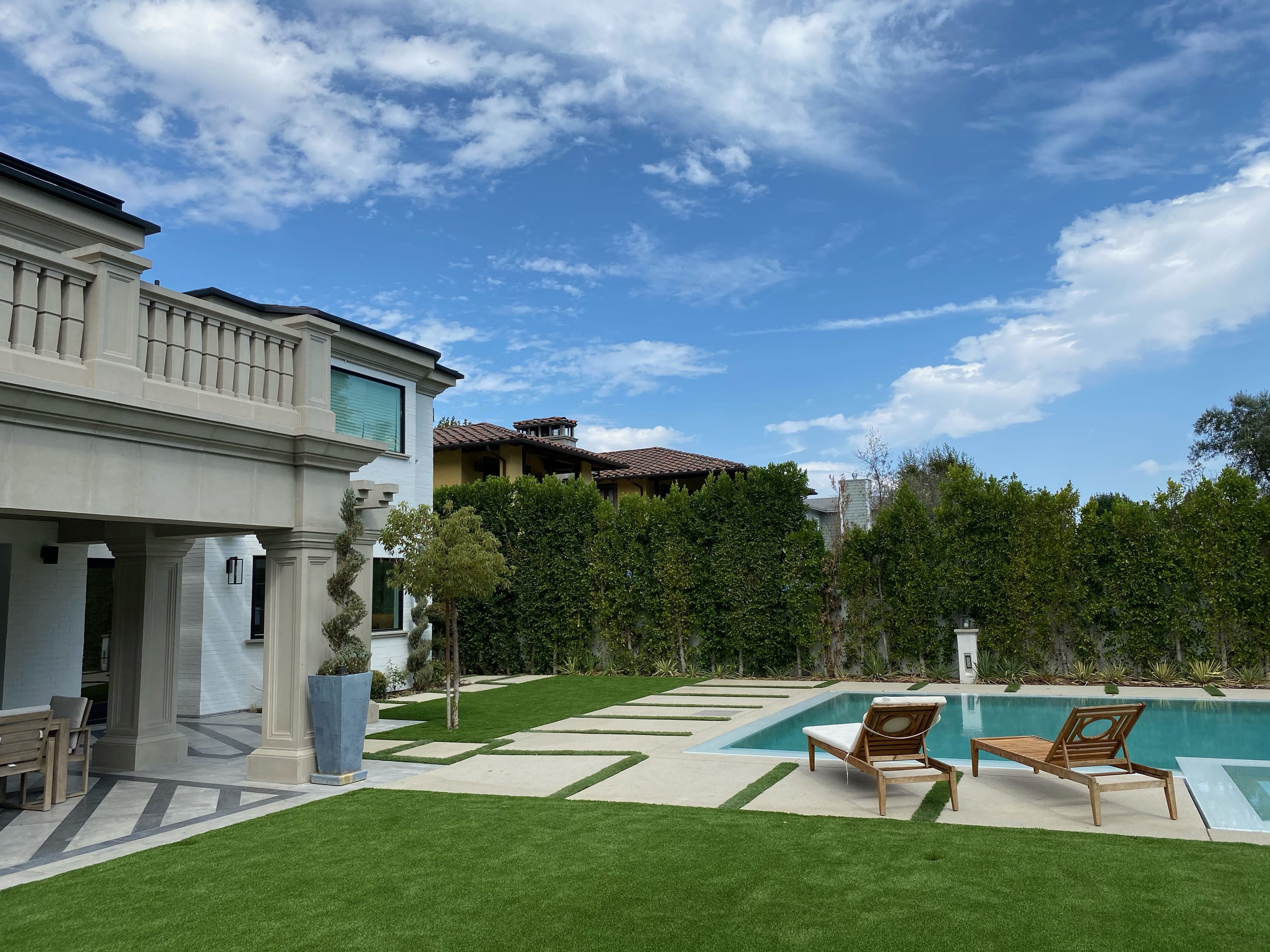 backyard pool and artificial grass