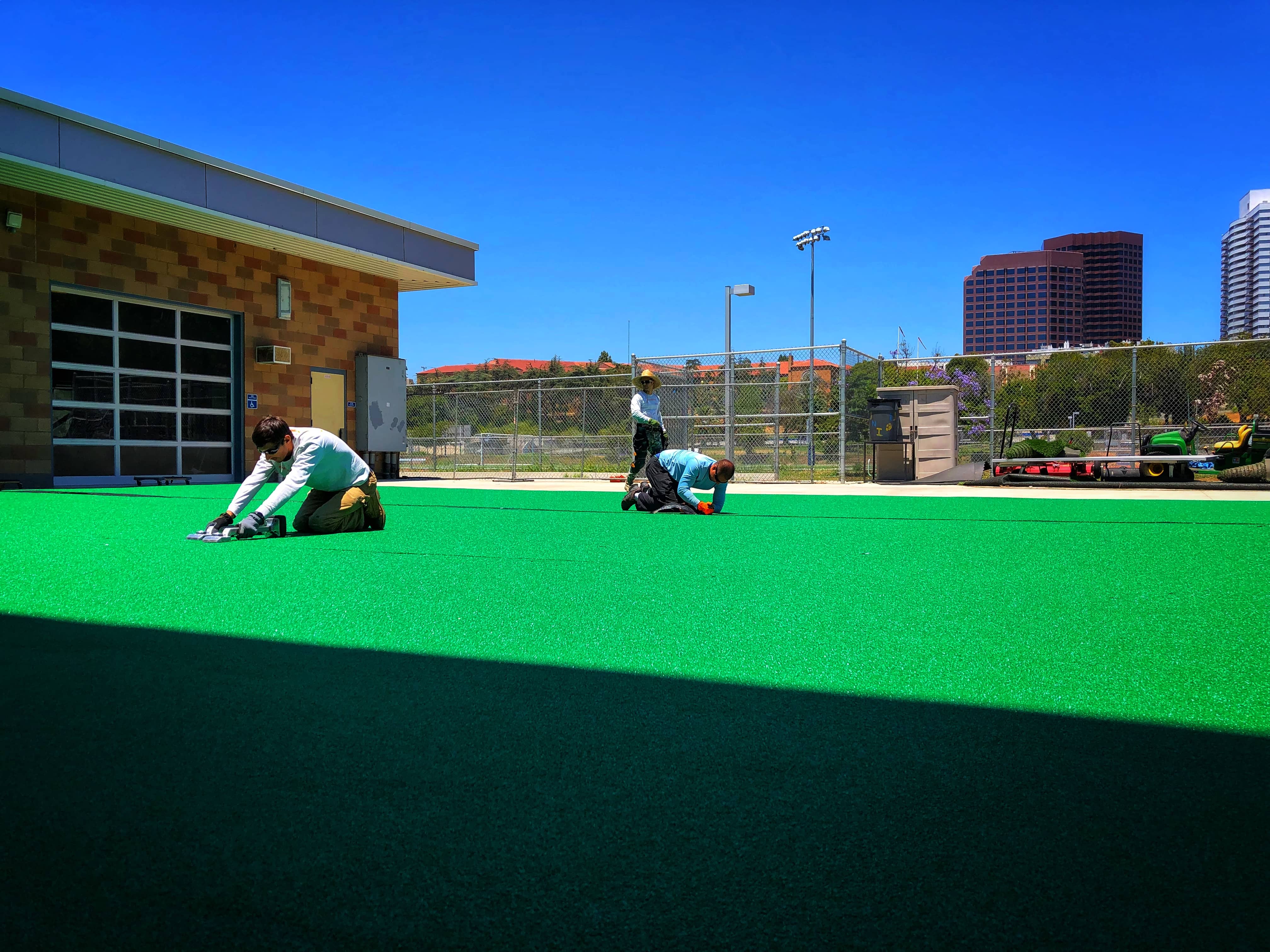 installers at work sports turf