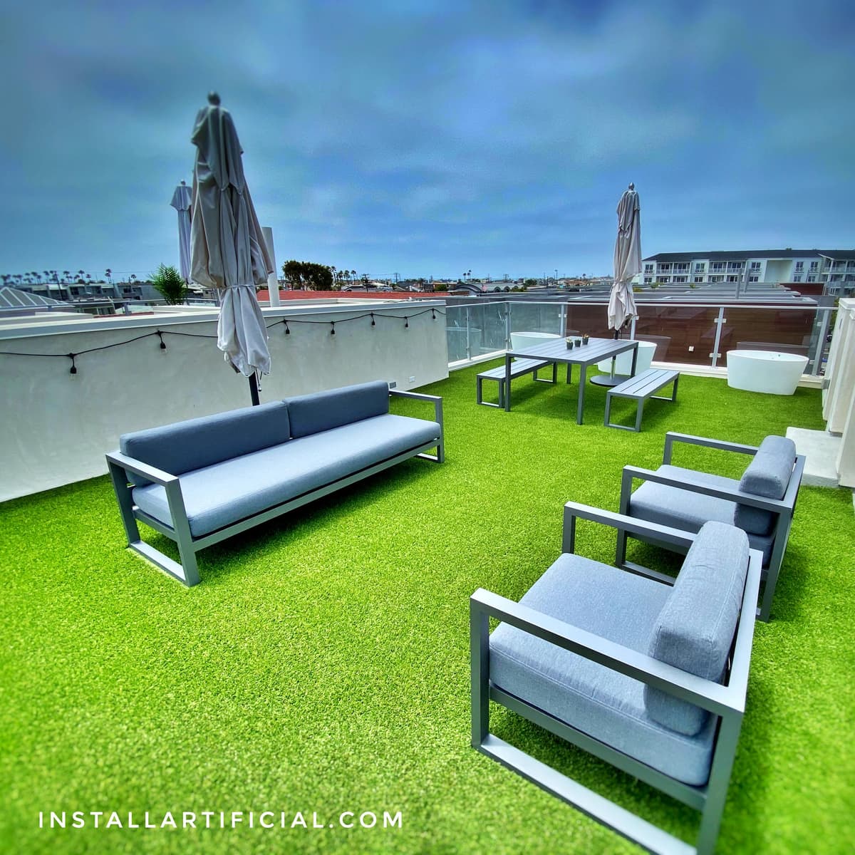 Converted rooftop into patio with artificial grass, residential