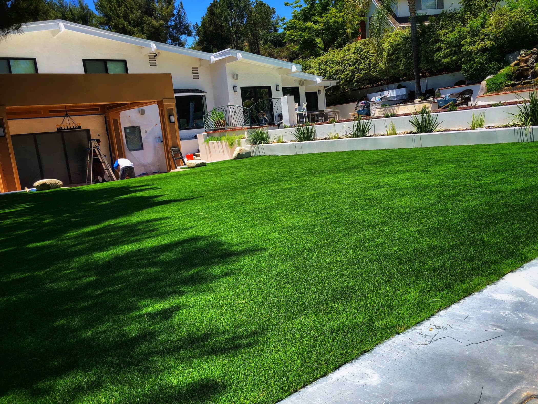 backyard renovated with artificial grass