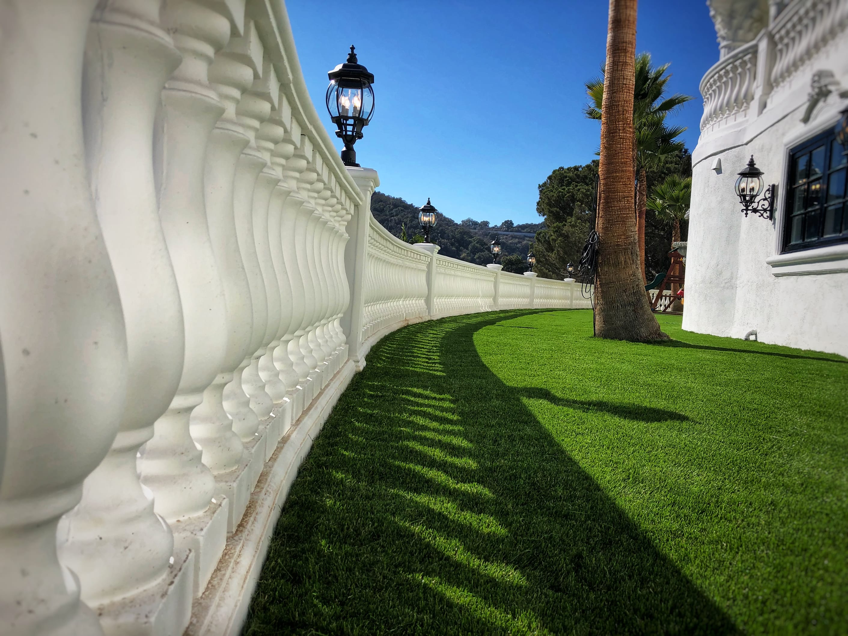 beautiful columns separating turf area